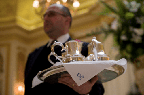 waiter serving tea silver Great Smart Places for Afternoon Tea - EAT LOVE SAVOR International Luxury Lifestyle Magazine