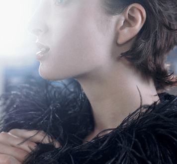 woman in boa Quotes: Our Greatest Happiness... - EAT LOVE SAVOR International Luxury Lifestyle Magazine