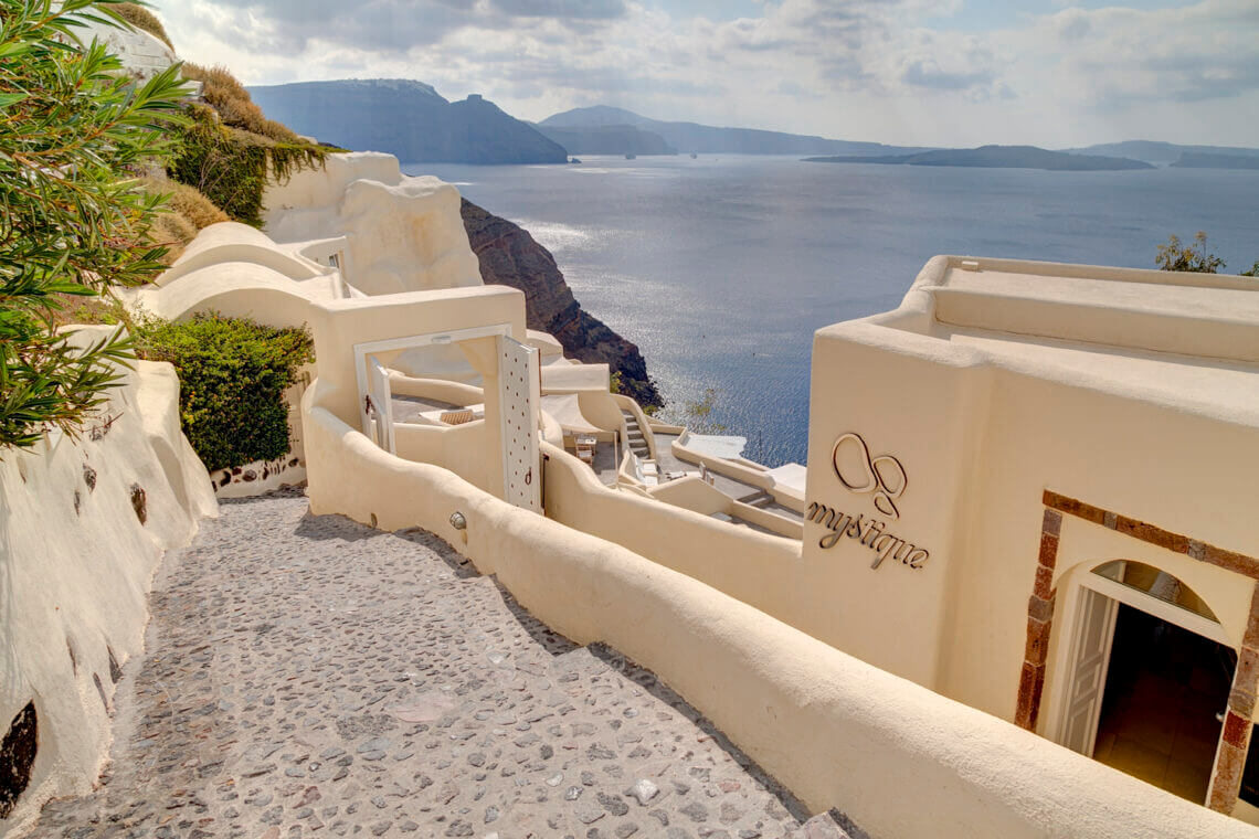 Mystique Hotel Lobby Discover the Ultimate Greek Escape for 2021: MYSTIQUE, a Luxury Collection Hotel Cut into an Extraordinary Sea Side Landscape - EAT LOVE SAVOR International Luxury Lifestyle Magazine